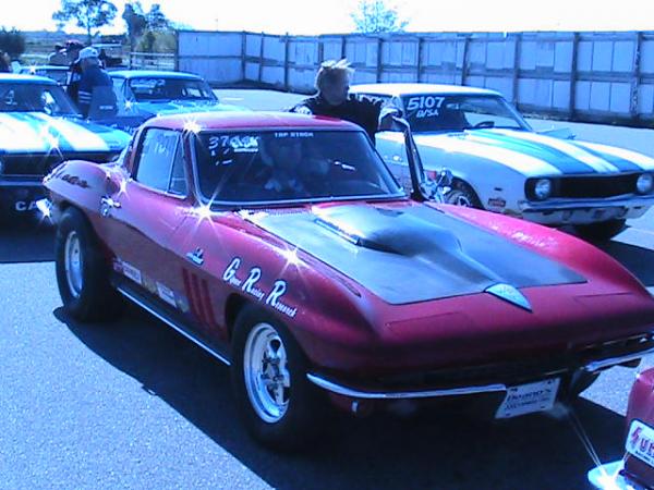 Bob Gipson's A stick 65 Corvette. In the paint booth at Dave Cech's shop. New paint Atomic Orange. Should be pretty cool.