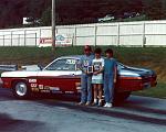 W2 Duster, winner of IHRA Hot Rod divisional race. 
With son Aaron and Penny, Track Champion and # 1 Fan.