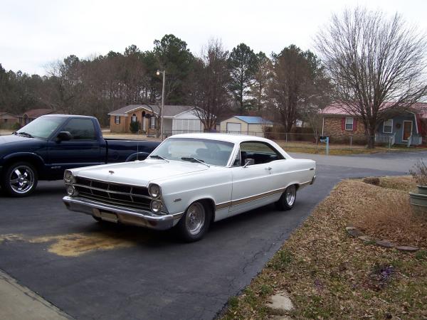 000 0042 The 67 has a reworked 289 with a four speed trans and a 9" rear
